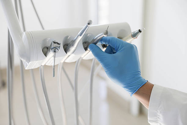 Professional Tooth Extraction technician working in Remington, IN